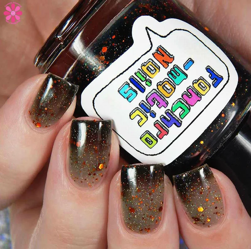 nail polish bubblegum pop-The Maze Nail Polish - color-changing black-to-clear with copper holo glitter