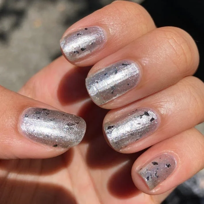 nail polish parsley pop-Witness Me Nail Polish - shiny and chrome with black shreds